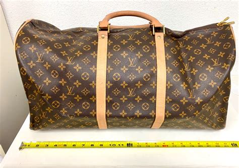 lv overnight bag fake|false louis vuitton bag.